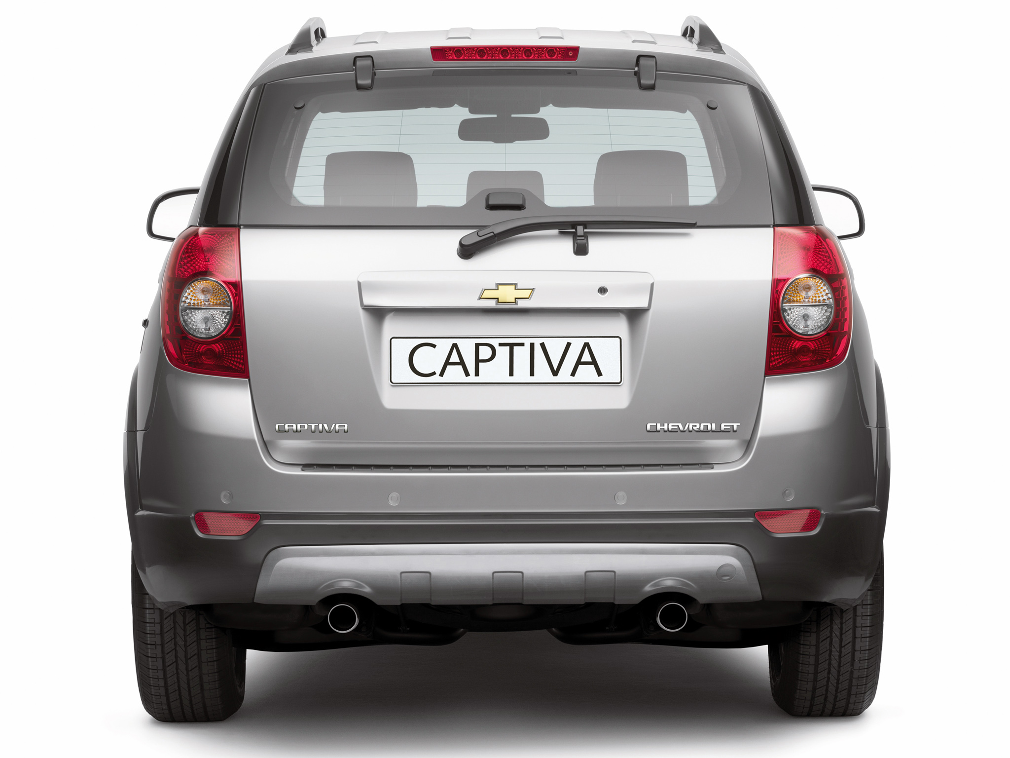 2.4 mt. Chevrolet Captiva 2008 сзади. Chevrolet Captiva i 2006 - 2011. Шевроле Каптива 2008 вид сзади. Captiva сзади.